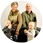 Smiling family with two toddlers