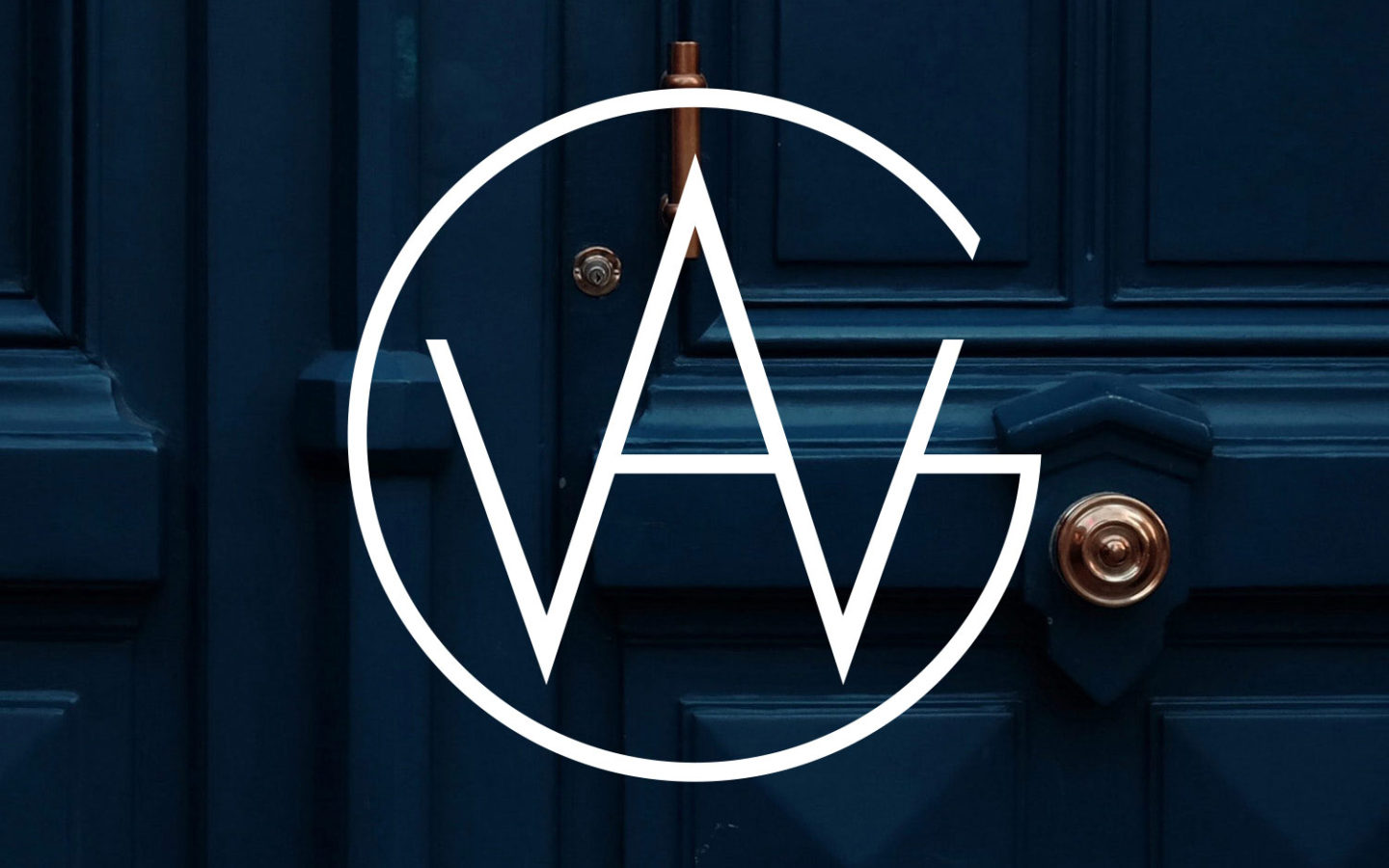 AWG Logo on deep blue wooden door with copper accents